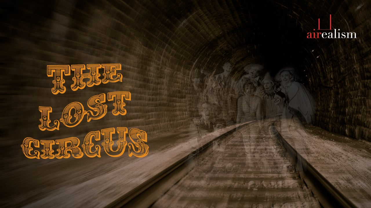Landscape flyer for The Lost Circus: title lettering over a railway tunnel with ghostly vintage circus performers